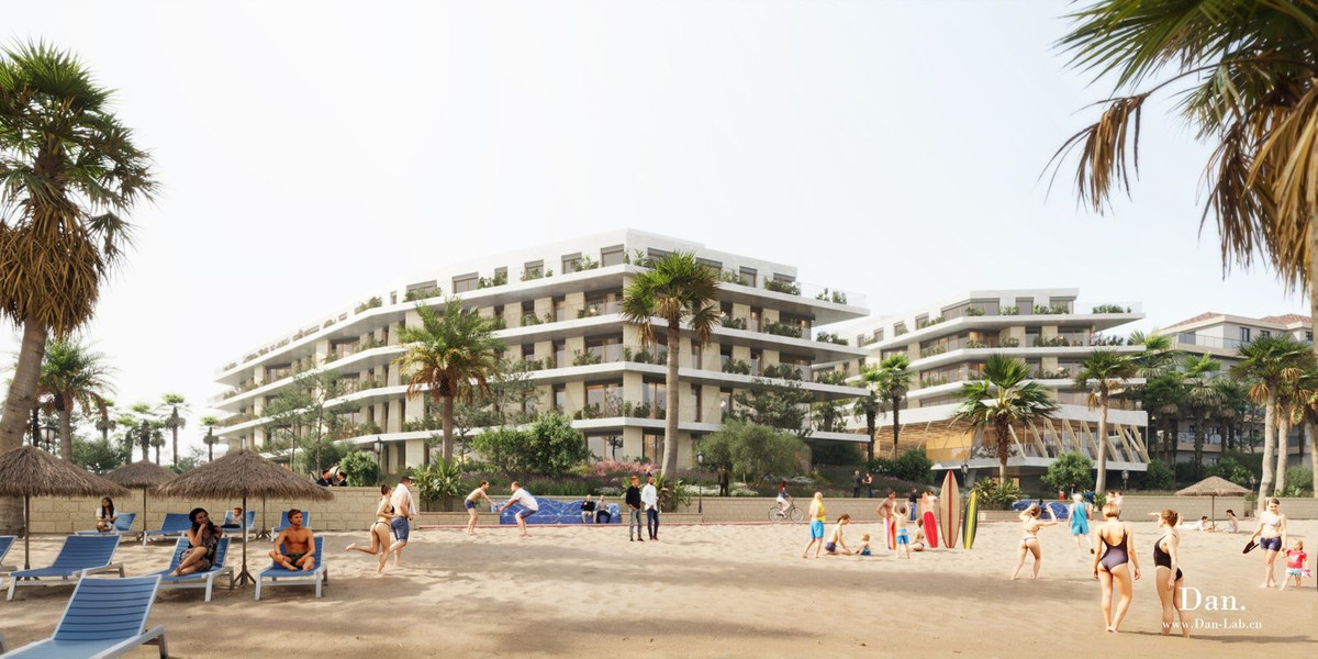 Modern beachfront hotel with ocean views, pool, and palm trees.
